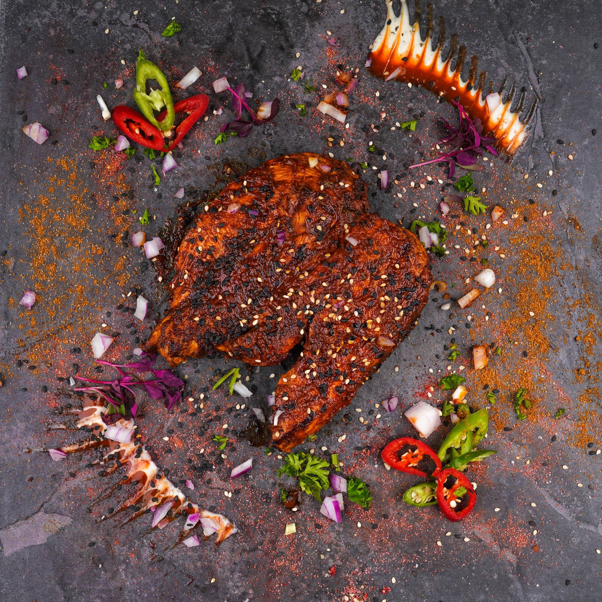 Chicken Breast on a grey plate with garnishes, low-carb ready-to-eat meal in Bootle for corporate lunchtime delivery