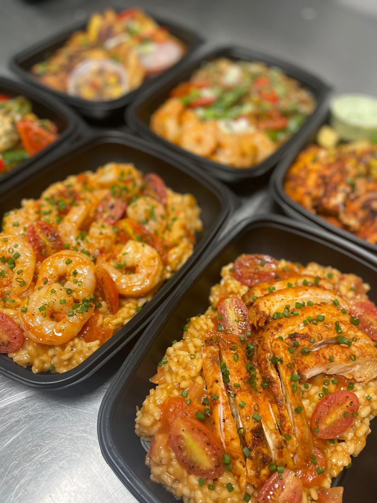 Selection of high-protein and low-carb meal prep corporate meals delivered in Winchester by Bosuprep for corporate wellbeing and productivity