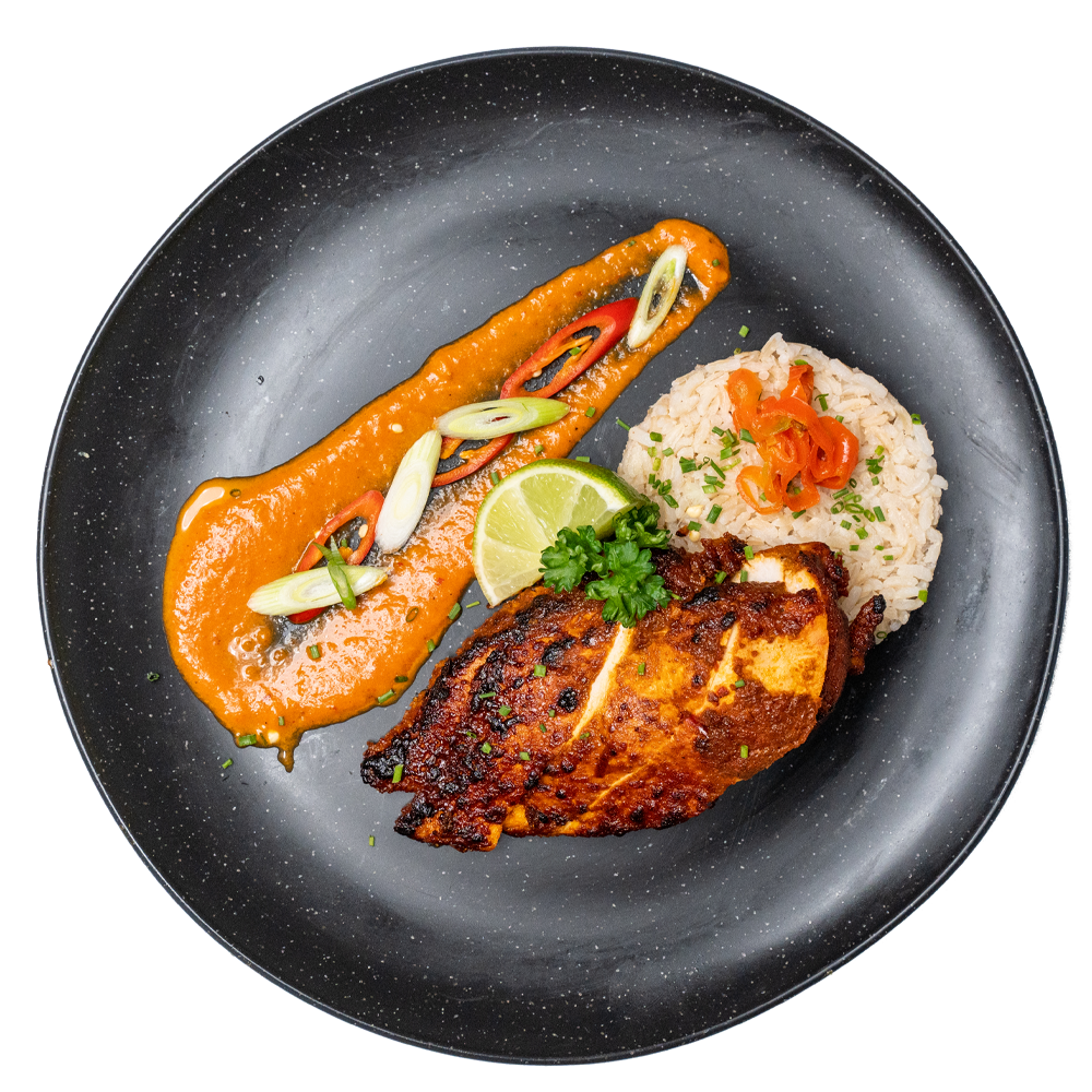 Chef-prepared healthy, vibrant fresh chicken and rice meal delivered by Bosuprep to offices in St Helens for corporate meal prep, boosting workplace wellness, productivity, and employee wellbeing.