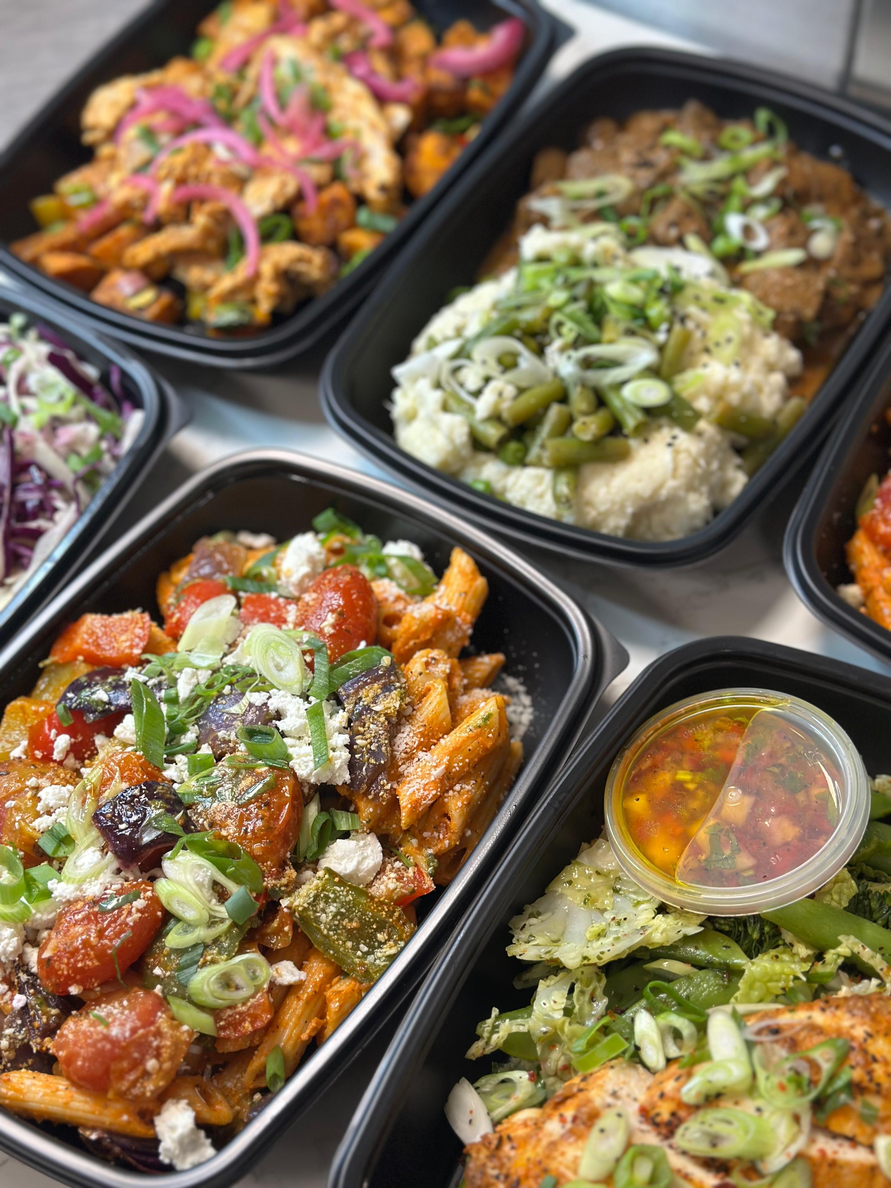 Selection of high-protein and low-carb meal prep corporate meals delivered in Sunderland by Bosuprep for corporate wellbeing and productivity