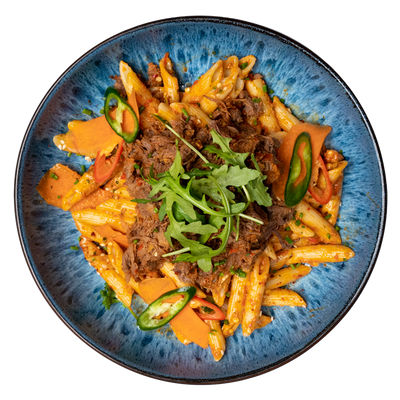 Penne pasta with meat and vegetables