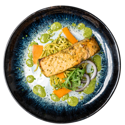 Salmon with vegetables and green sauce